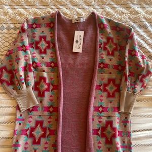 Brand new Crazy Train Aztec cardigan.